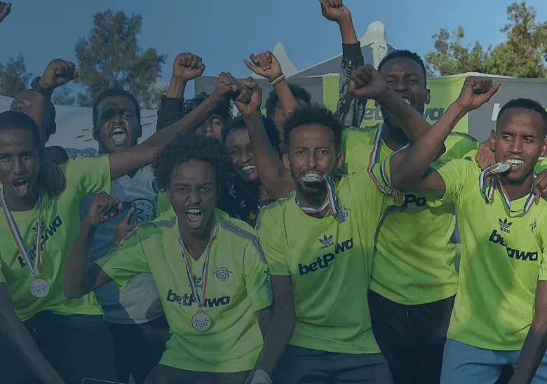 betPawa-sponsored footballers celebrating with medals